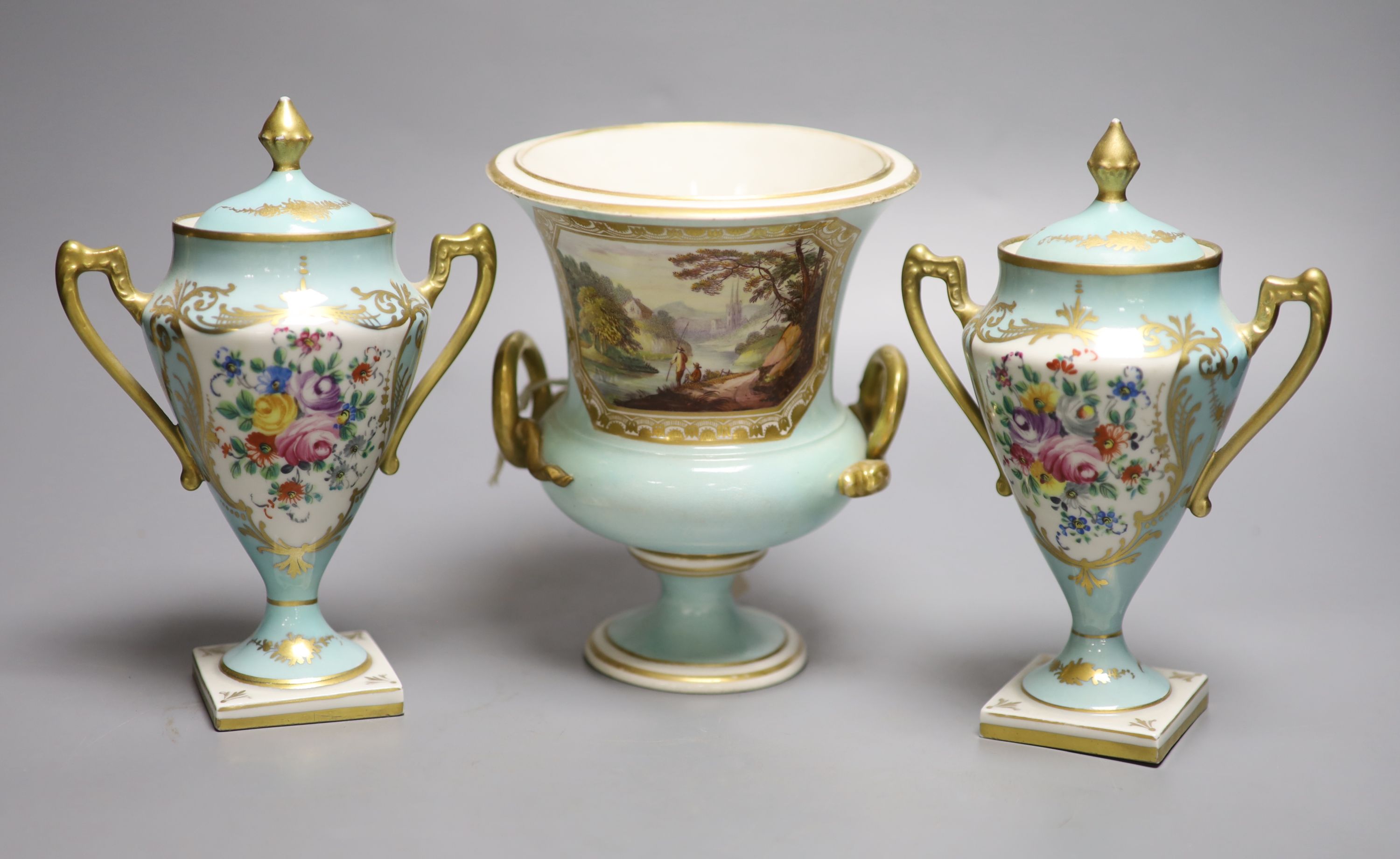 A Derby urn, In Italy, height 17cm and a pair of French porcelain urns and covers